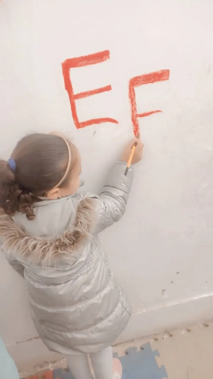 Photograph 3 from: Teaching young children to replace random scribbling with decorating the wall with attract